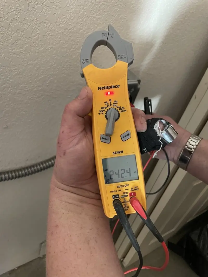 Voltage testing with clamp meter during Hot Tub / Pool Electrical Wiring in Mountain Brook